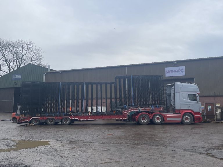 Curing chamber racking loaded for delivery