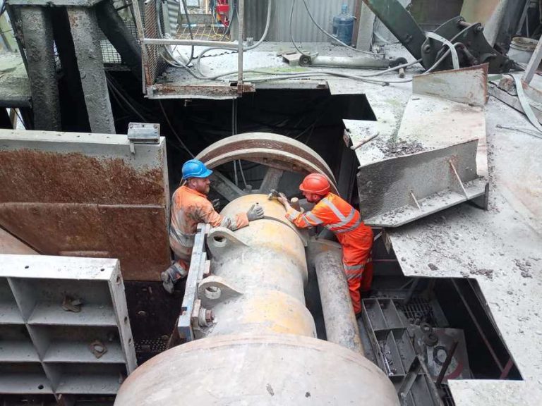 Engineers on a large shaft